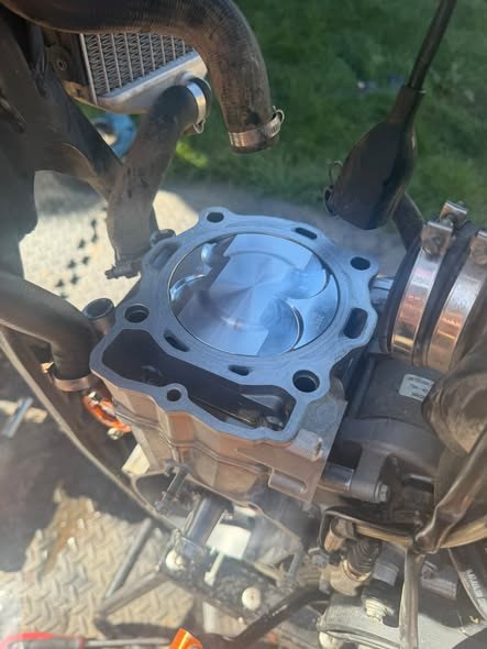 KTM SX-F 450 piston and cylinder during top-end rebuild